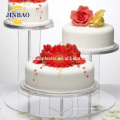 Soporte de exhibición de acrílico modificado para requisitos particulares de la torta del diseño de la fábrica de lujo de la manera de JINBAO